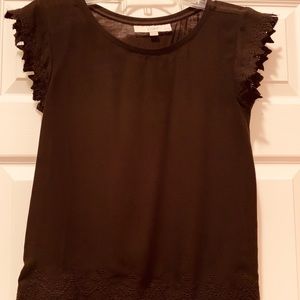 Black Loft Top with details on sleeves and bottom